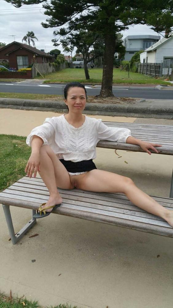 20P Chinese milf flashing in public