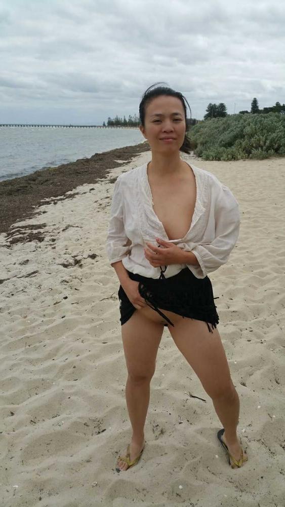 20P Chinese milf flashing in public
