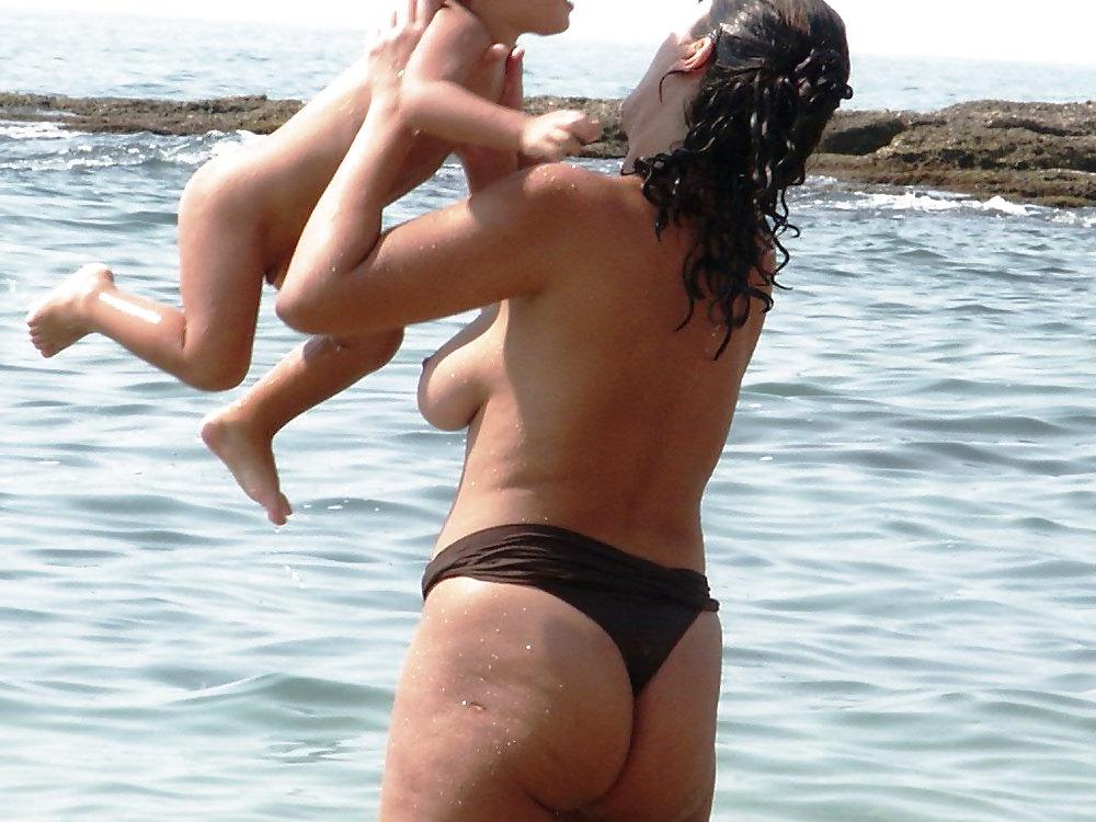 25P Mature on beach with big tits