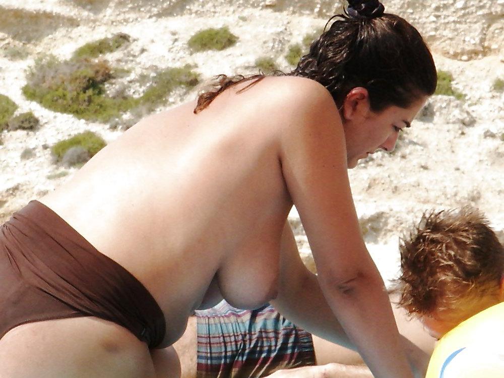 25P Mature on beach with big tits