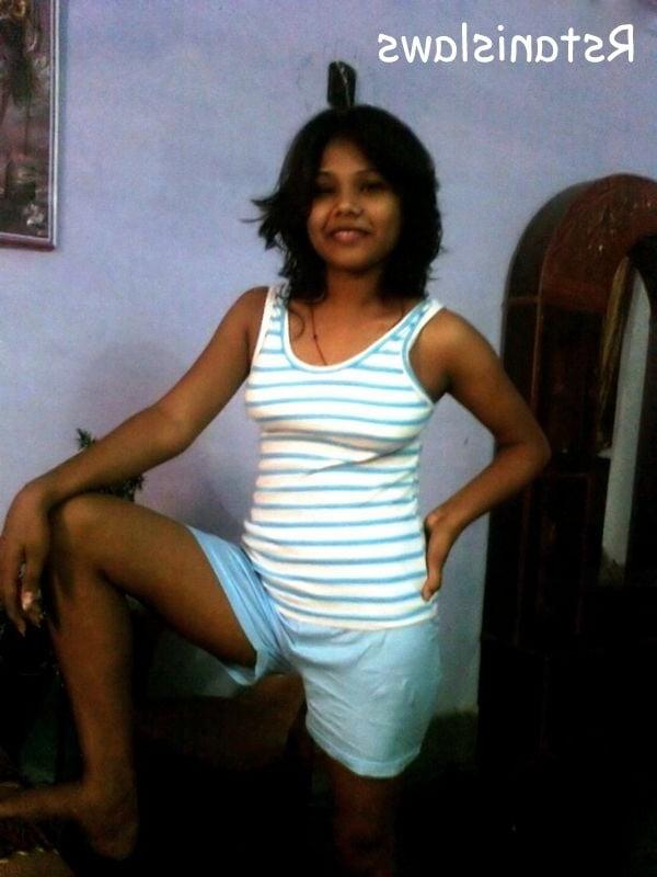 8P lady posing in stripped panty and bra showing hot figure.
