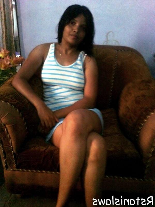 8P lady posing in stripped panty and bra showing hot figure.