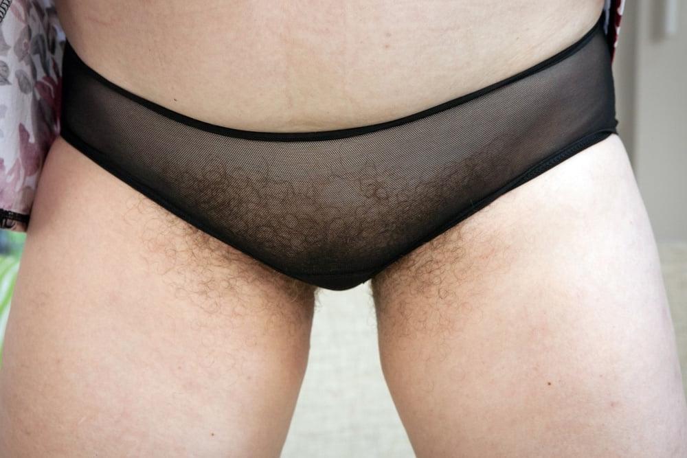 25P Hairy Mature Posing in the Living Room