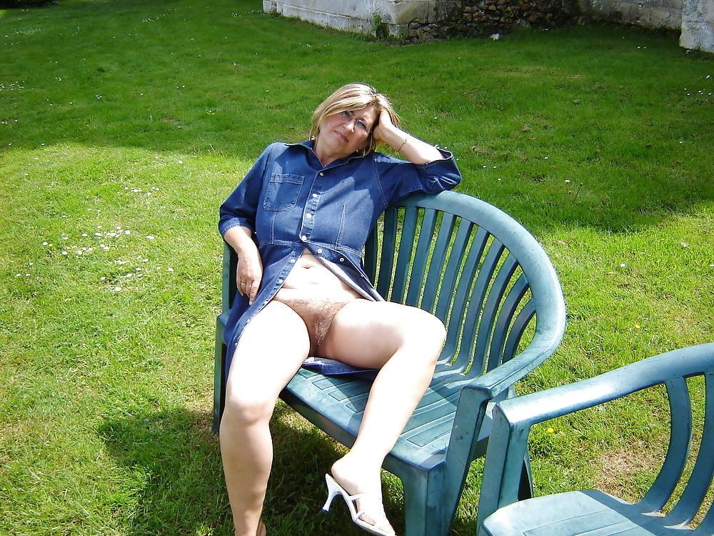 23P Big titted&amp;bushed granny flashing outdoors