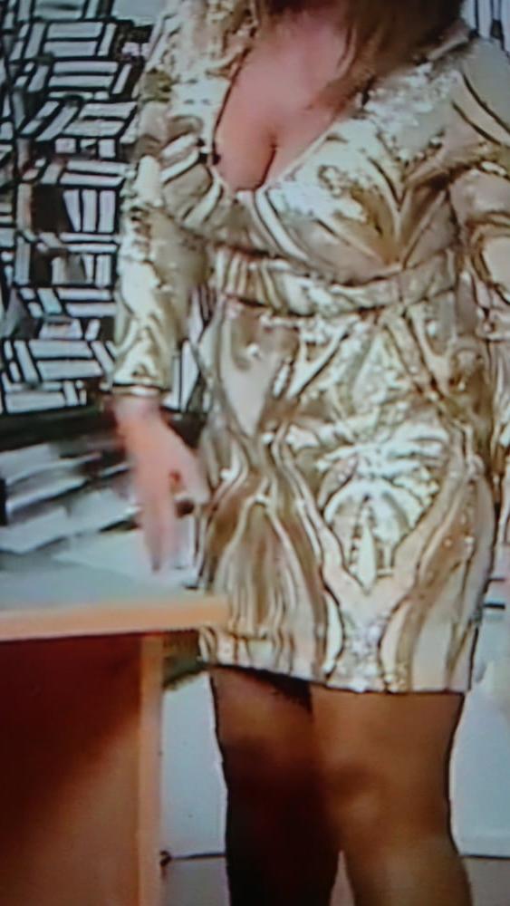 25P Hot Tv host With beautyful nylon legs and great tits.