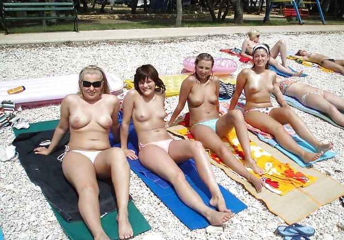 20P Topless beach girls 2.