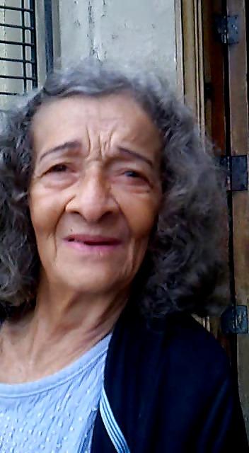 13P Grandmother begging at the entrance of the church