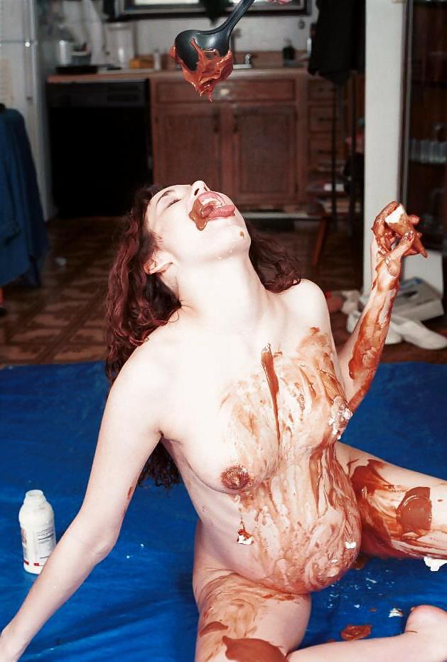 25P Preggy brunette playing with dildoes and food