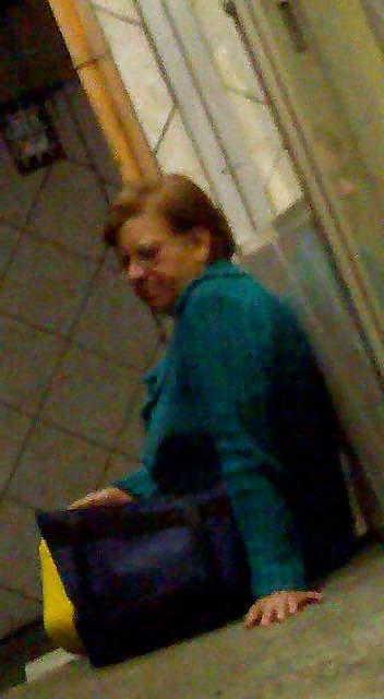21P Grandmother in rainy night