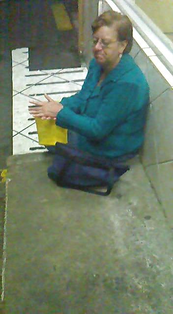 21P Grandmother in rainy night