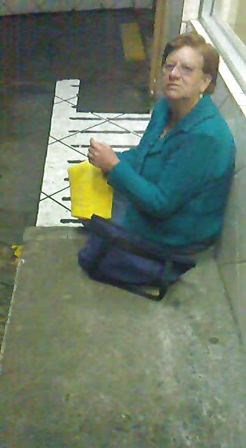 21P Grandmother in rainy night