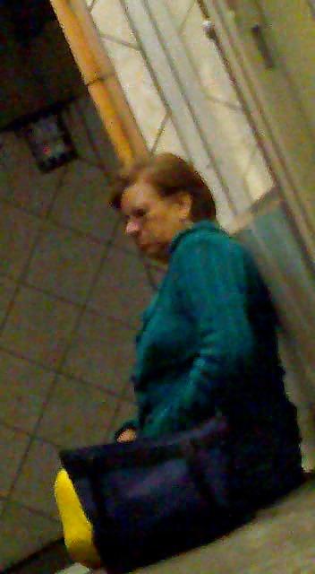 21P Grandmother in rainy night