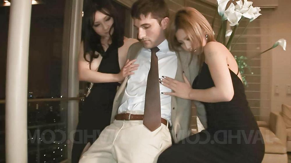 14P Two Japanese girls blow white guy