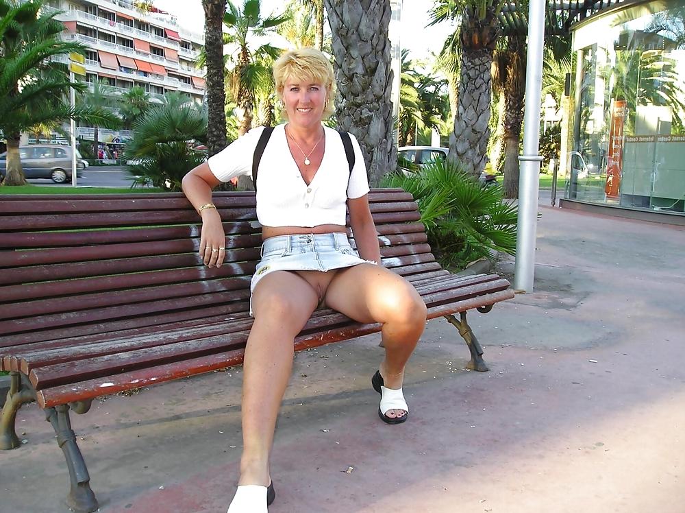 25P Sluts upskirt and nude on benches 5