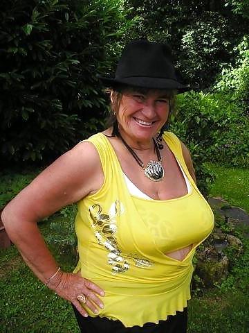 24P Busty mature women dressed.