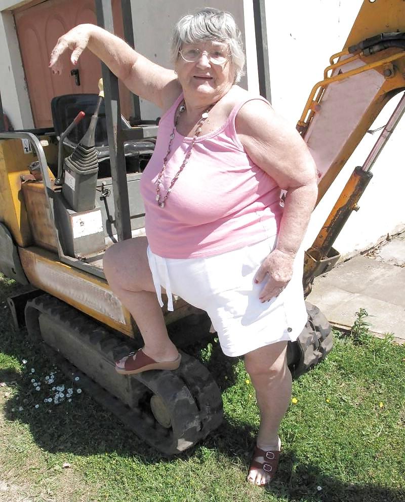24P Busty mature women dressed.