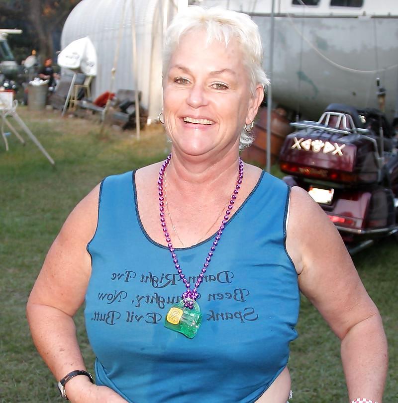 24P Busty mature women dressed.