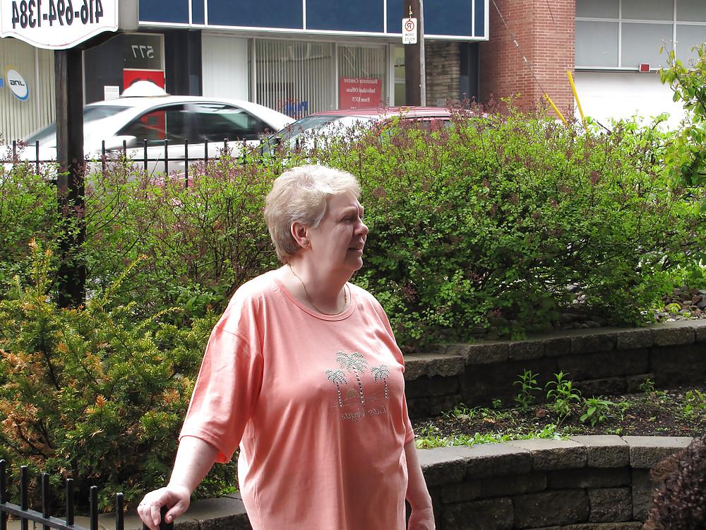 24P Busty mature women dressed.