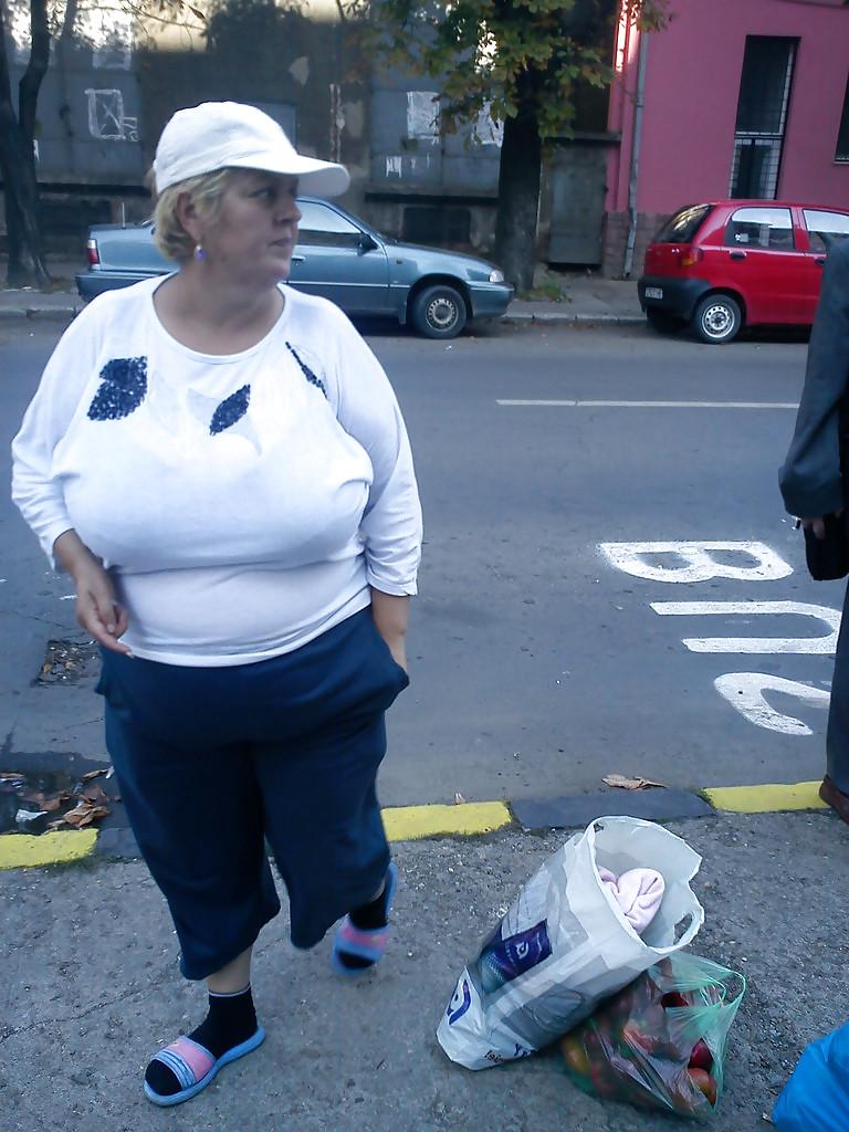 24P Busty mature women dressed.