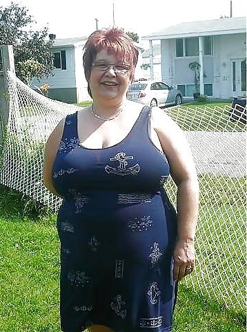 24P Busty mature women dressed.