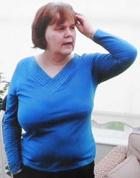 24P Busty mature women dressed.