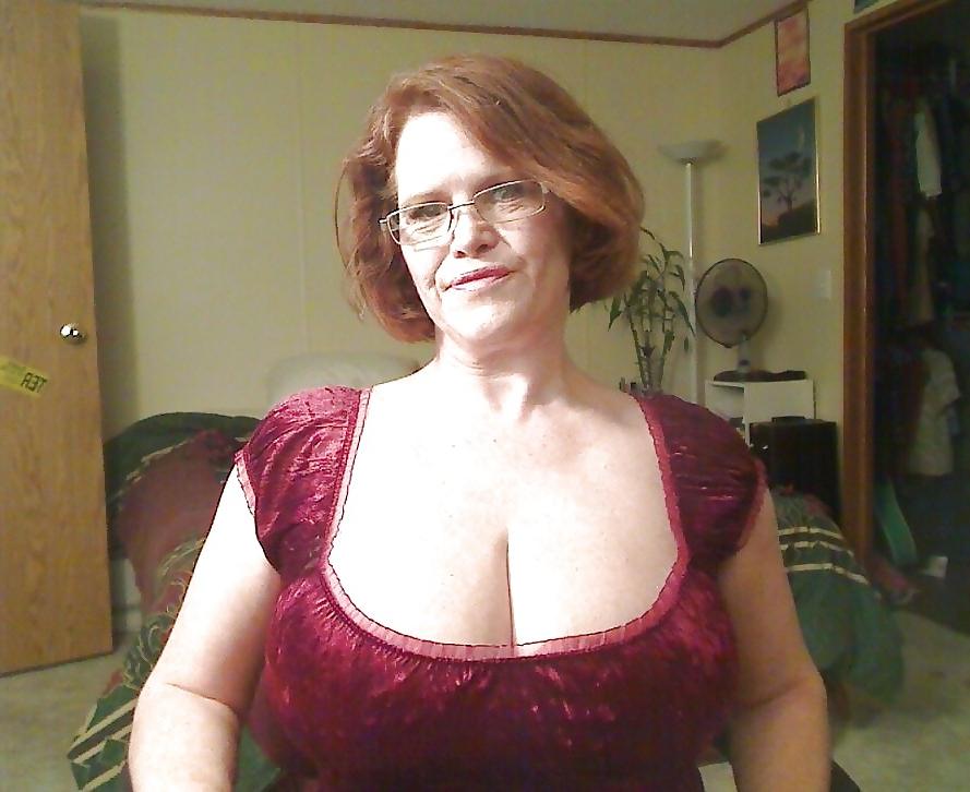 24P Busty mature women dressed.