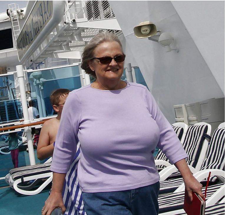 24P Busty mature women dressed.