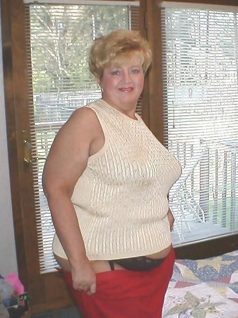 24P Busty mature women dressed.