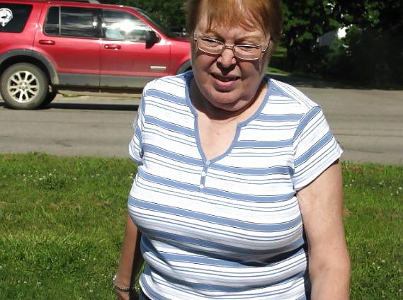24P Busty mature women dressed.