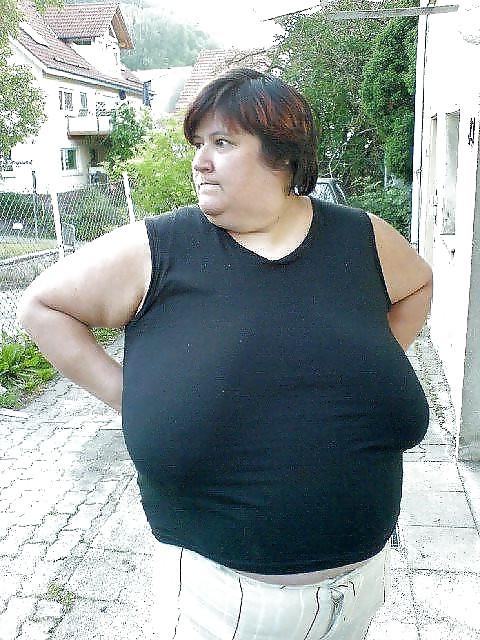 24P Busty mature women dressed.