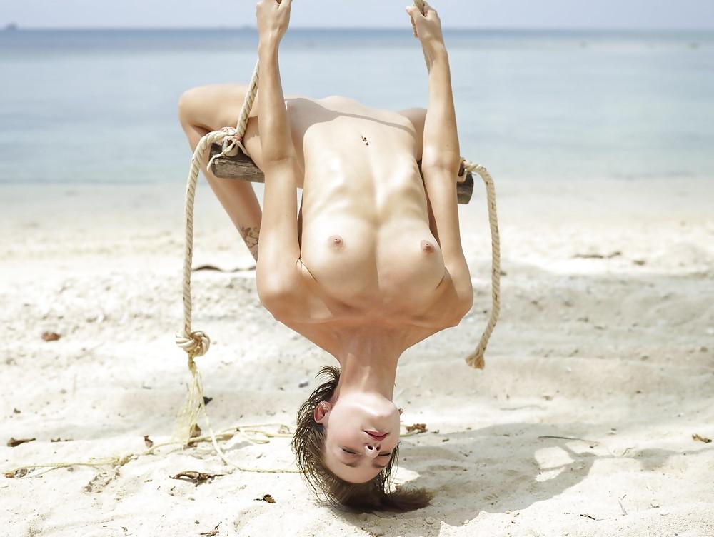 20P The Beauty of Teen Pussy on a Swing