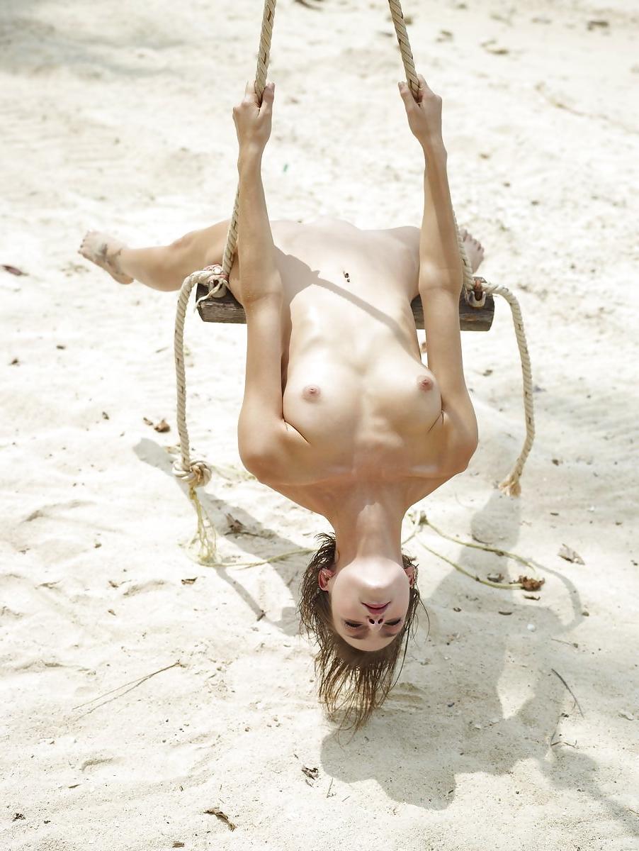 20P The Beauty of Teen Pussy on a Swing