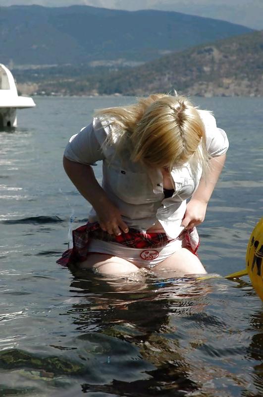 19P Chubby blonde taking a dip in a lake