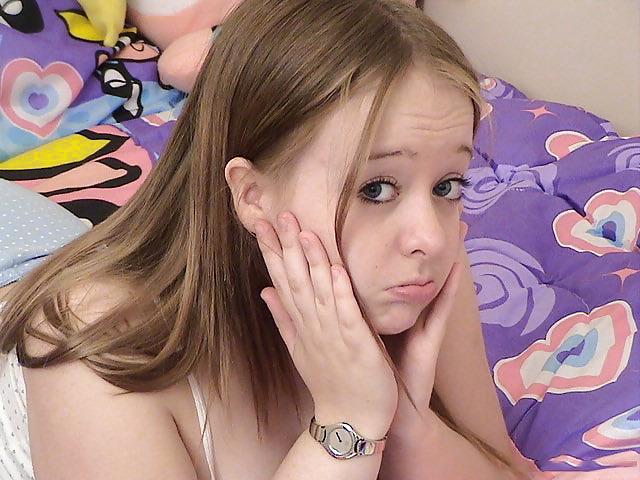 15P Chubby brunette playing cards on her bed