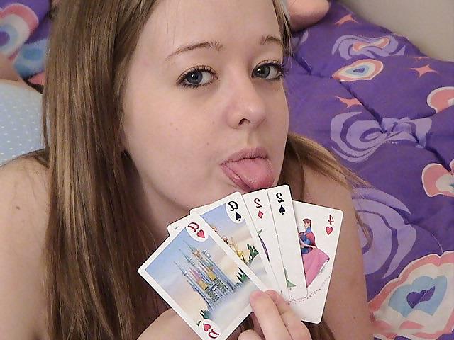 15P Chubby brunette playing cards on her bed