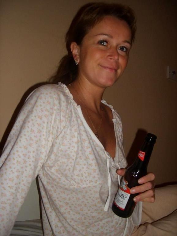 11P Mature Amateur Poses With Her Budweiser