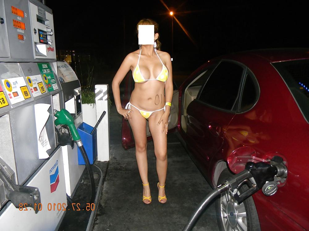 10P NINA latina pumping gas after bikini contest