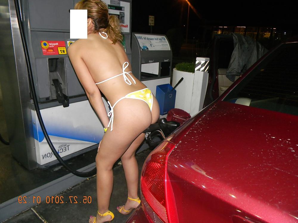 10P NINA latina pumping gas after bikini contest