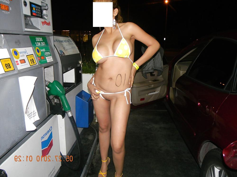 10P NINA latina pumping gas after bikini contest