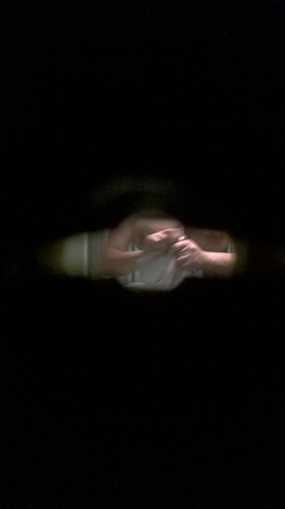 7P Voyeur 23 Yo. cute busty girl spied through the keyhole