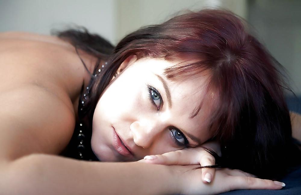 15P Brunette Dasa posing on her bed