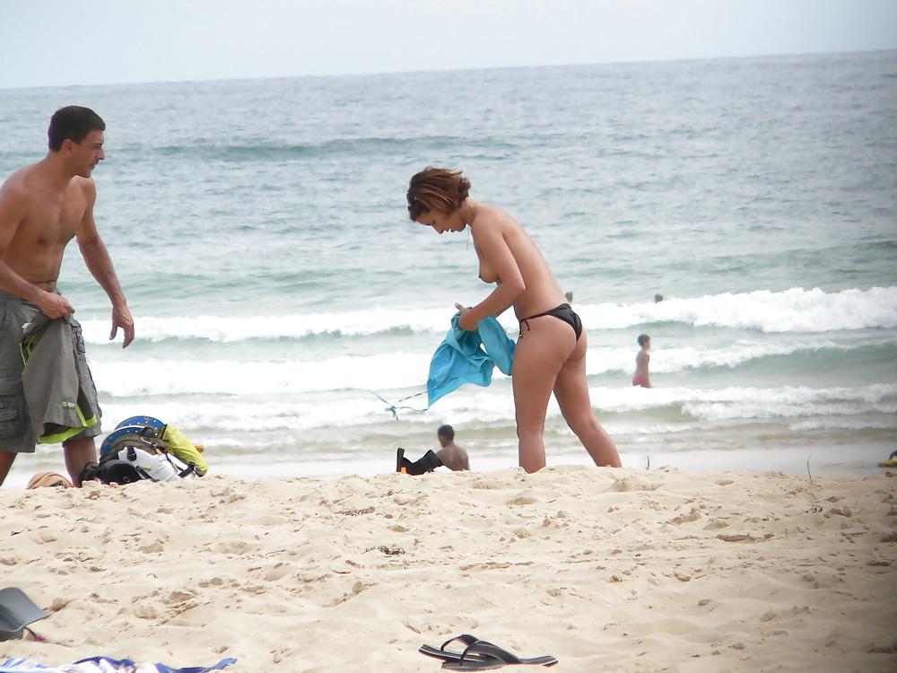 6P Topless beach brunette