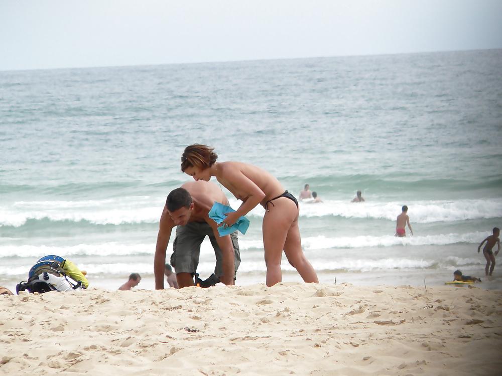 6P Topless beach brunette