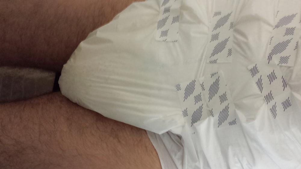 25P Me wet wearing a large Attends diaper