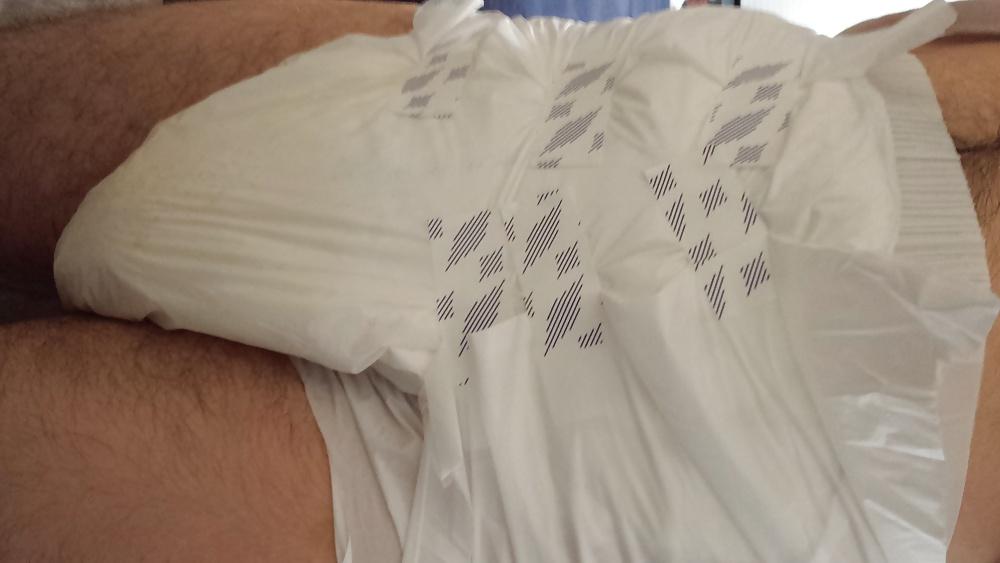 25P Me wet wearing a large Attends diaper