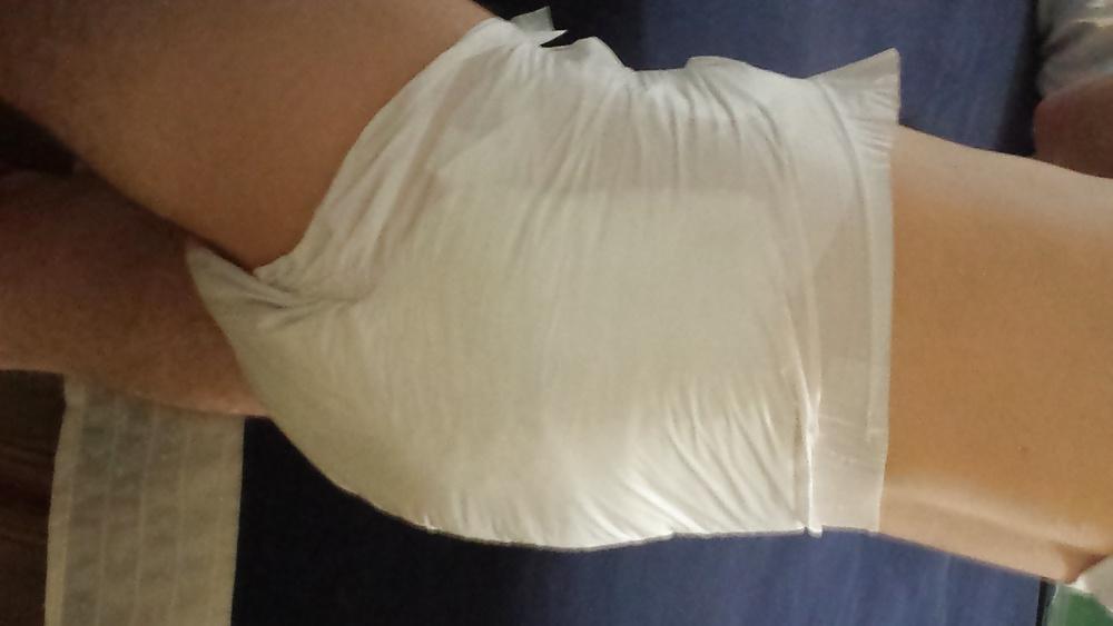 25P Me wet wearing a large Attends diaper