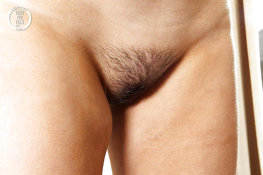 16P Busty amateur babe fingers her hairy cunt