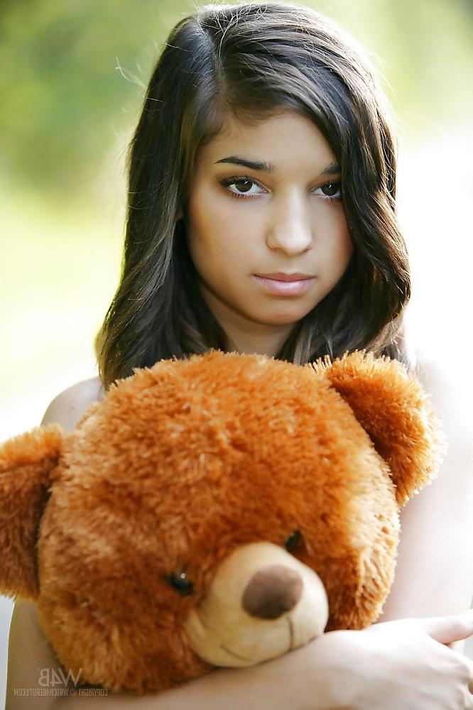 15P Girl Nika  playing with her teddy bear