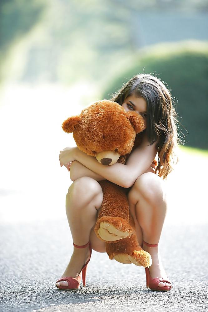 15P Girl Nika  playing with her teddy bear