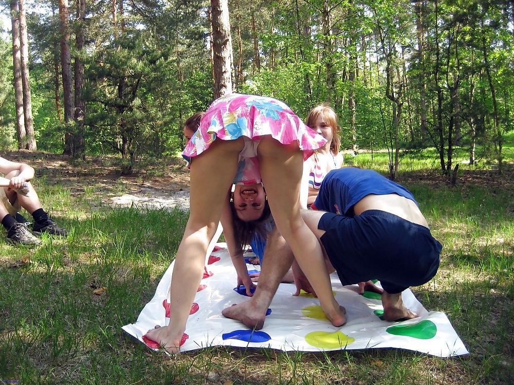 25P Playing Twister, Upskirt, Nude and Downblouse